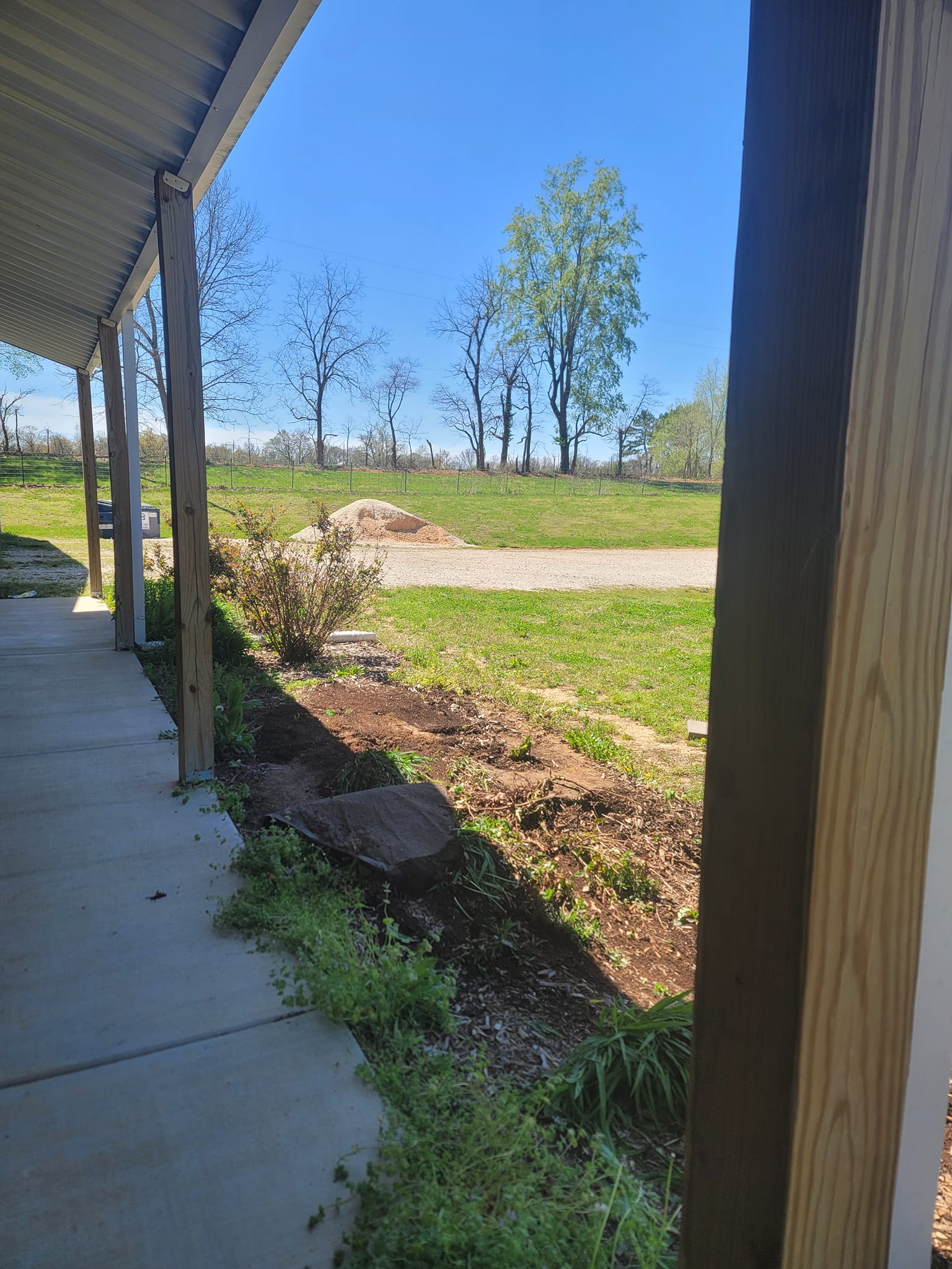 Soil prepared for a flower bed.